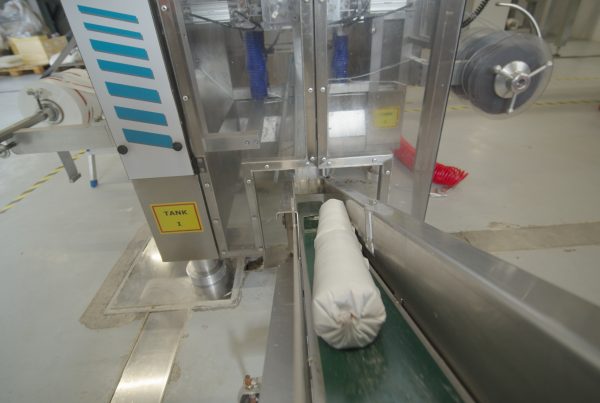 Sealed cartridge on the conveyor of ELTEK's chub packaging unit